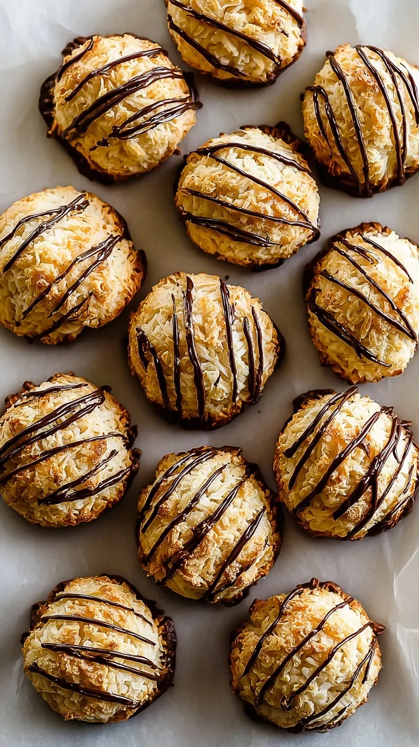 Golden brown chewy coconut macaroons piled on a white serving platter