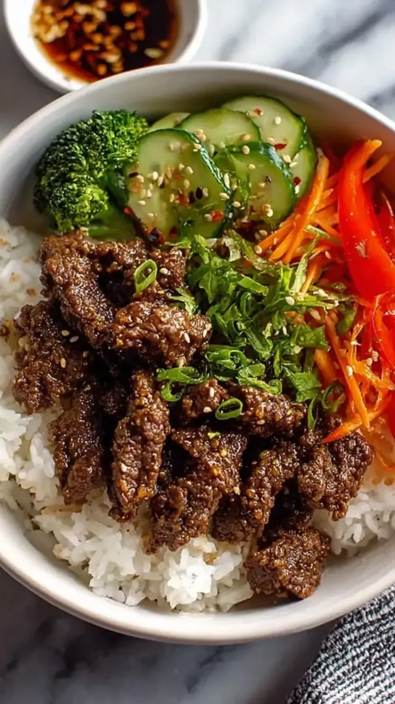 Juicy sliced teriyaki beef served over jasmine rice with steamed broccoli and sesame seeds